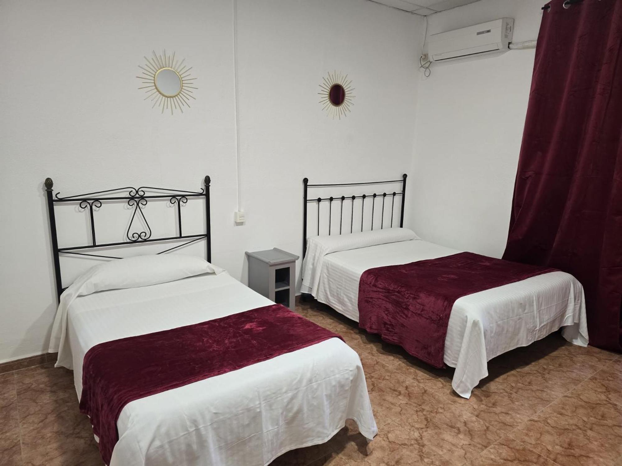 Quarto Triplo com Casa de Banho Partilhada